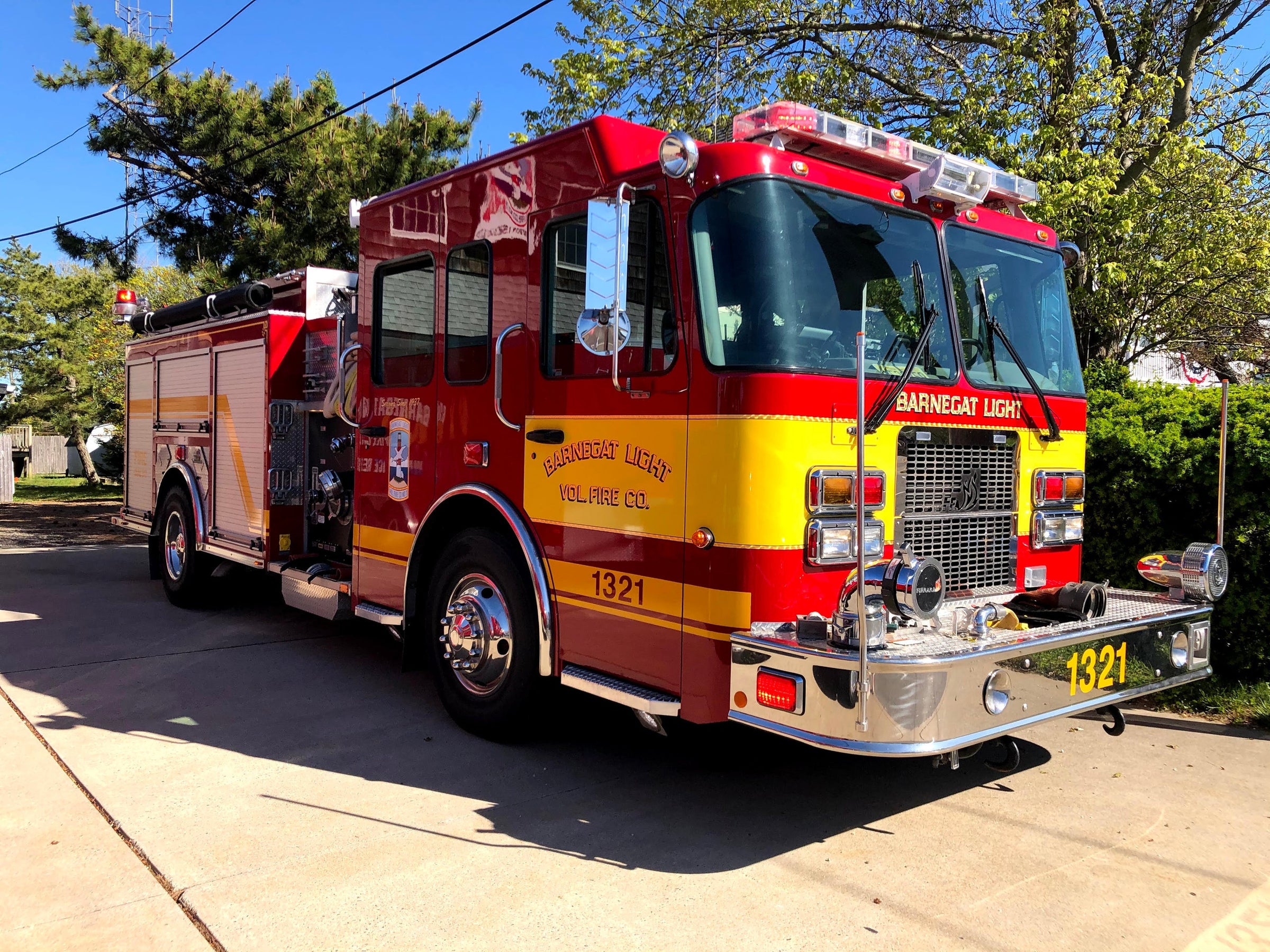 The Volunteer Fire Department emergency rescue vehicle racing through  Speculator, NY USA responding to an emergency with lights flashing Stock  Photo - Alamy, image size:2400x1800